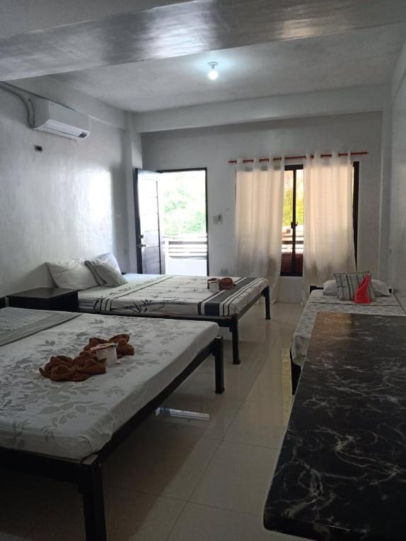 Chelle'S Apartelle-Inn El Nido Ngoại thất bức ảnh